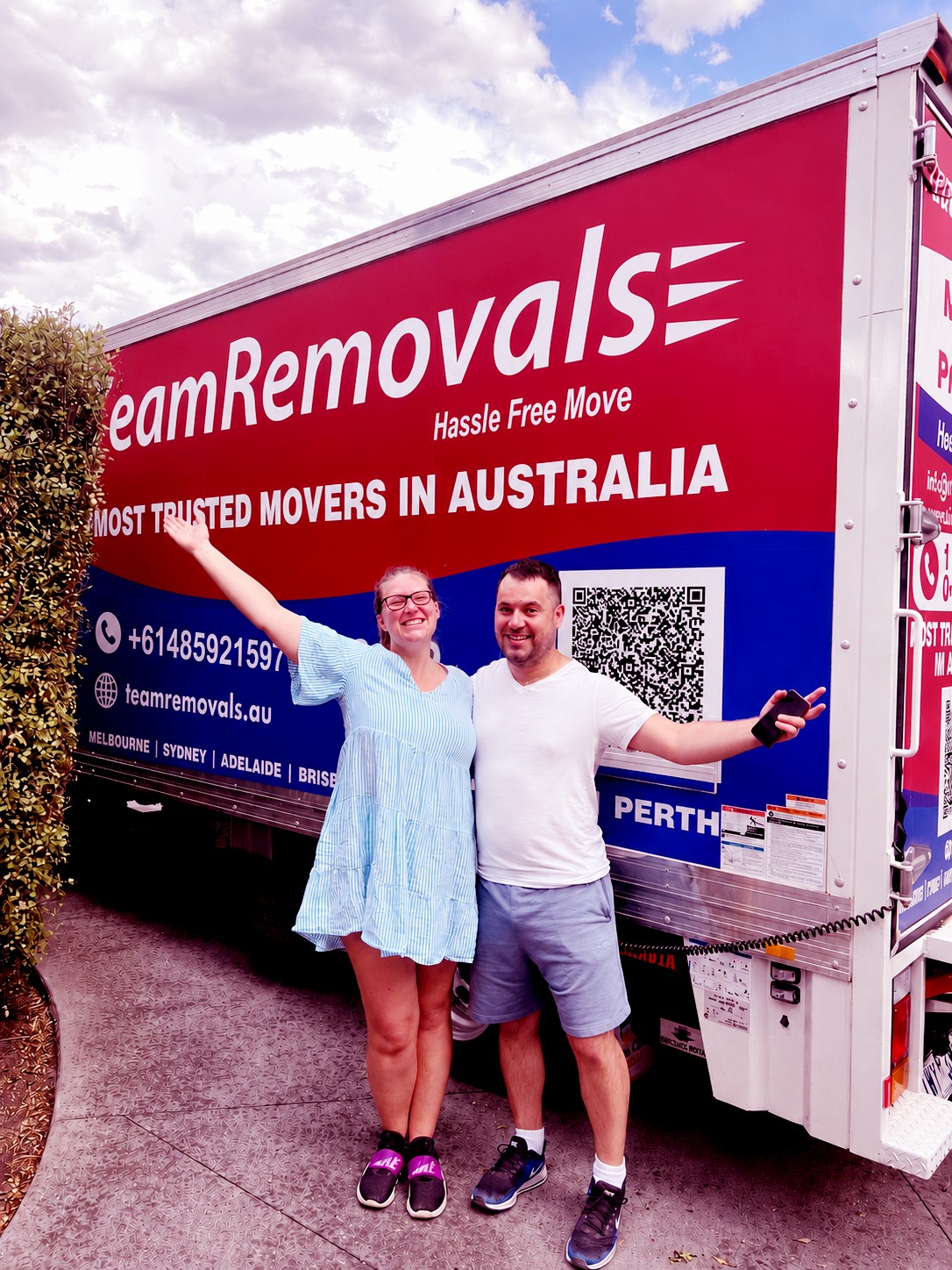 Team Removals Crew with Sign
